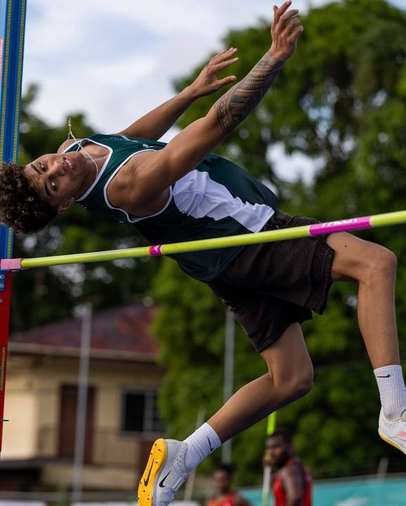 Clearing the high jump bar
