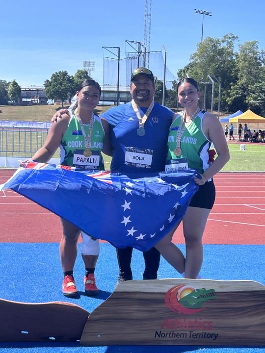 On the podium with the Cook Islands flag