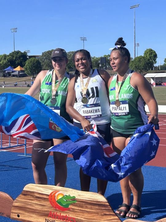 Medallists share the podium with their flags