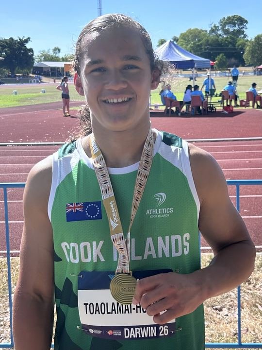 A big smile and a medal