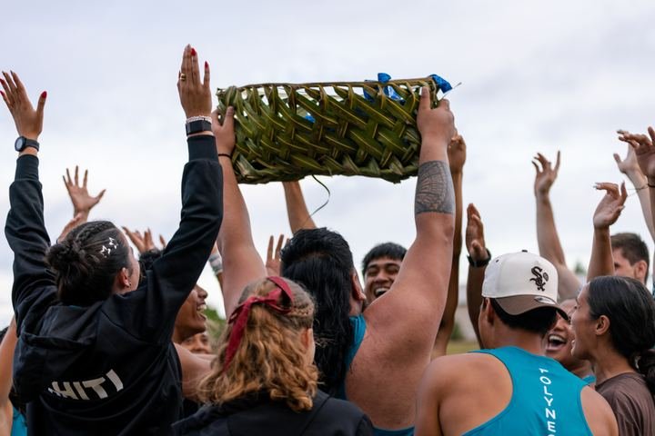 Celebrations as the woven trophy is lifted