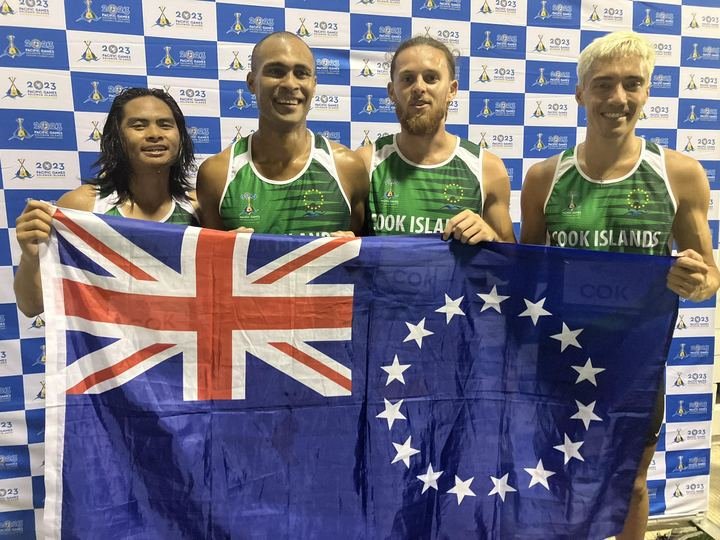 Cook Islands athletes with the flag