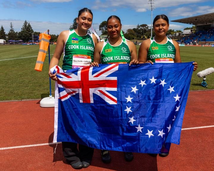 Cook Islands athletes with the national flag