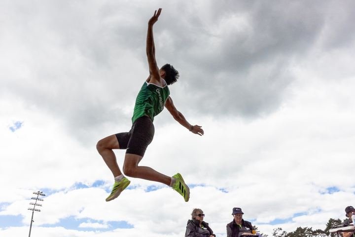 Long jumper in full flight