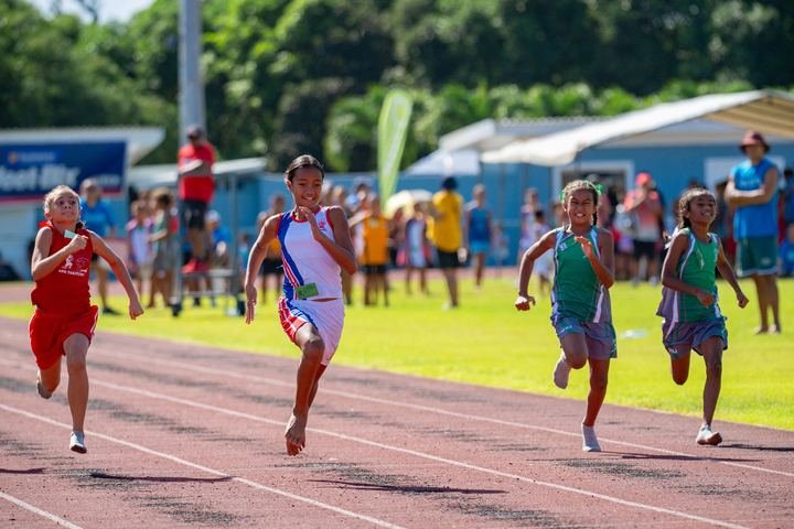 Girls sprint for the line on the home straight