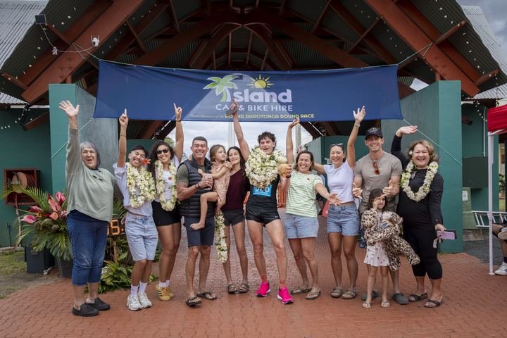 Family, friends and supporters celebrate at the finish