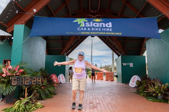 Lynnsay Francis, the last finisher, completes the 31km walk in a personal best